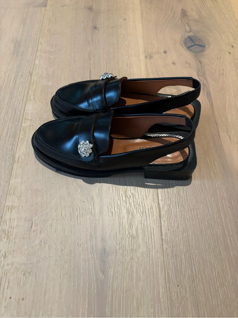 Ganni Black Leather Slingback Loafers with Crystal Brooch